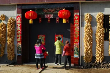 Why did the ancients like to post door gods?